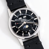 vintage zodiac wristwatch triple date calendar dial shot, on its back