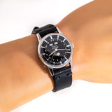 vintage zodiac wristwatch triple date claendar wrist shot, close up