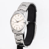 vintage rolex oyster perpetual dial shot, side view