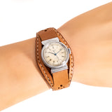 vintage movado watch wrist shot, close up