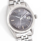 vintage rolex datejust grey dial shot, on its back