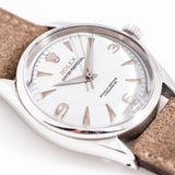 vintage rolex oyster perpetual dial shot, close up side