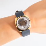 additional dial shot, close up on wrist