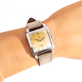 omega watch wrist shot, close up