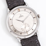 vintage omega wristwatch dial shot, on its back
