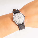 vintage omega wristwatch wrist shot, close up