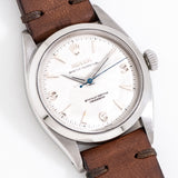 vintage rolex oyster perpetual dial shot, on its back
