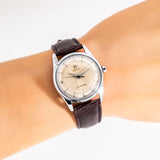 vintage omega watch wrist shot, close up