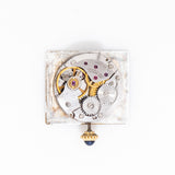 vintage cartier tank must de white movement shot
