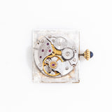vintage cartier tank must de white movement shot
