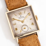 vintage rolex precision dial shot, on its back
