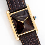 cartier tank brown dial shot, on its back