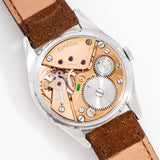 vintage omega stainless steel ww movement shot