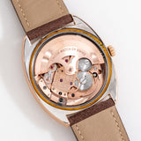 vintage omega constellation rose gold, movement shot
