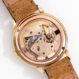 vintage omega black dial rose gold, movement shot