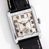 vintage bulova square-shaped ww, on its back