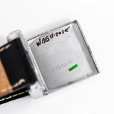 vintage bulova square-shaped ww, interior case back