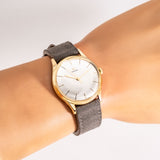 vintage omega yg ww, wrist shot close up