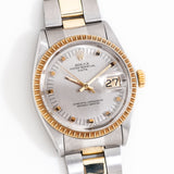 vintage rolex date two tone ww, on its back