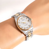 vintage rolex date two tone ww, wrist shot close up