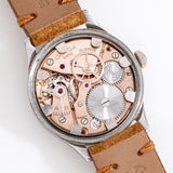 vintage omega ww2 wristwatch, movement shot