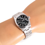 vintage rolex date black ww, wrist shot close up