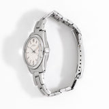 vintage rolex mid-size ww, side view with crown