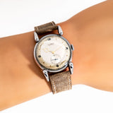 gubelin stainless steel ww, wrist shot close up