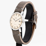 vintage omega geneve ss watch, side view with crown