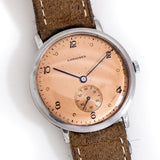 vintage longines salmon ww, on its back