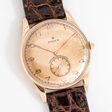 vintage rolex rose gold chronometer, on its back
