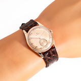 vintage rolex rose gold chronometer, wrist shot close up