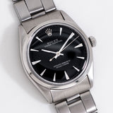 vintage rolex oyster perpetual black dial ww, on its back