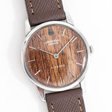 vintage Universal Geneve wood dial, on its back
