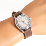 vintage omega ww, wrist shot close up