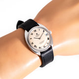 vintage universal geneve white shadow ww, wrist shot close up