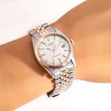 vintage rolex rose gold and stainless steel ww, wrist shot close up