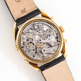 vintage longines yellow gold triple date moon phase, movement shot