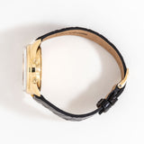 vintage longines yellow gold triple date moon phase, additional case shot seen on its side