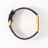 vintage cartier tank md black dial ww, on its side