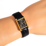 vintage cartier tank md black dial ww, wrist shot close up