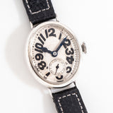 vintage mido oval ww, on its back