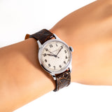 vintage jlc WWII wristwatch, wrist shot close up