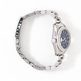 rolex laying on its side with crown shown