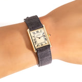 wrist shot of the cartier tank, close up