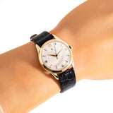 vintage omega watch wrist shot, close up