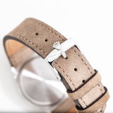 rolex oyster watch strap shot, buckle signed by rolex