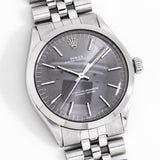 vintage rolex oyster perpetual grey dial shot, on its back