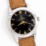 vintage omega seamaster black dial shot, on its back