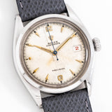 vintage rolex oysterdate red date dial shot, on its back